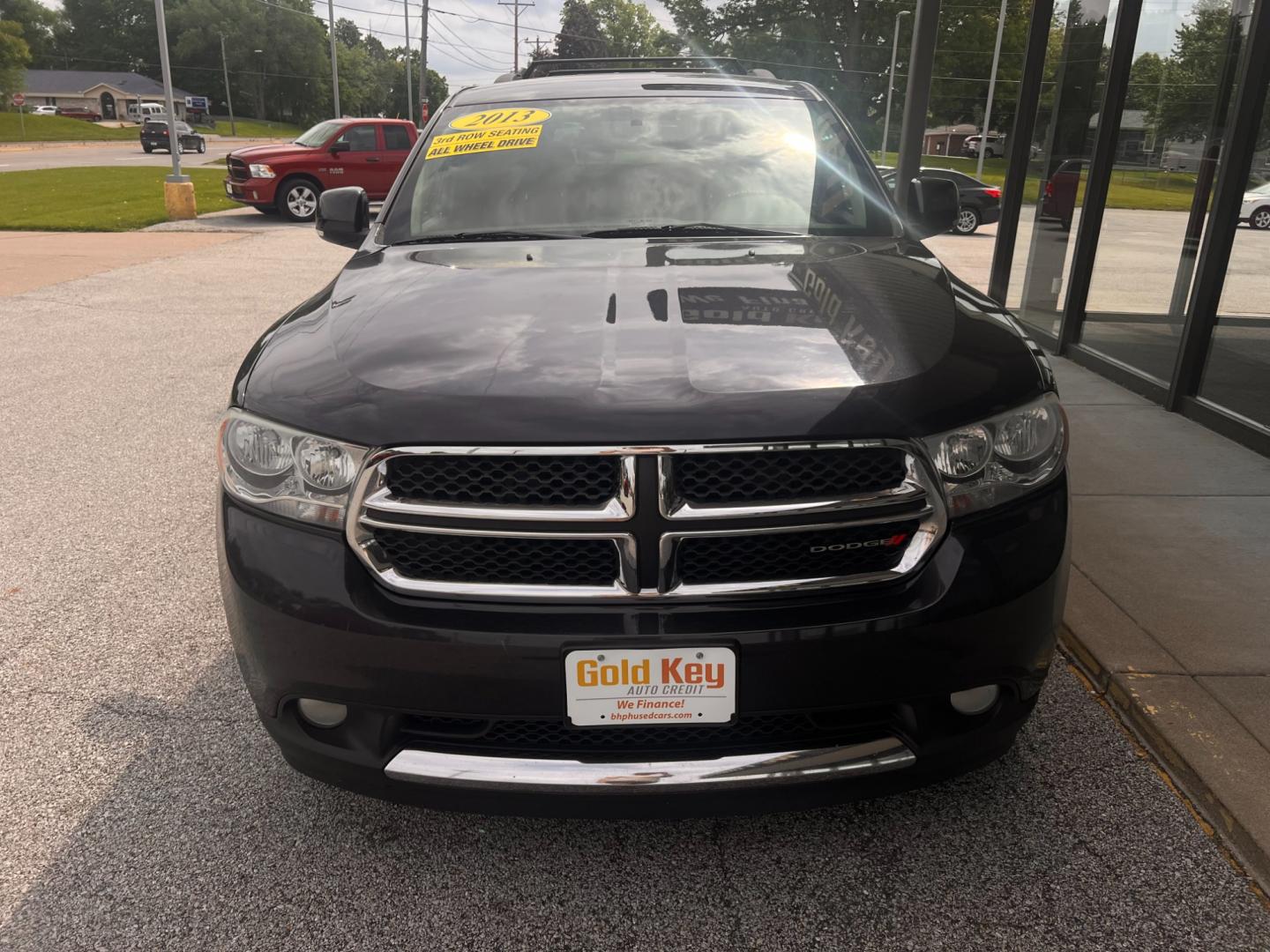 2013 Brilliant Black Crystal Pearl Dodge Durango Crew AWD (1C4RDJDG8DC) with an 3.6L V6 DOHC 24V engine, 5-Speed Automatic transmission, located at 1633 W Kimberly, Davenport, IA, 52806, (563) 323-5341, 41.559456, -90.598732 - Photo#2